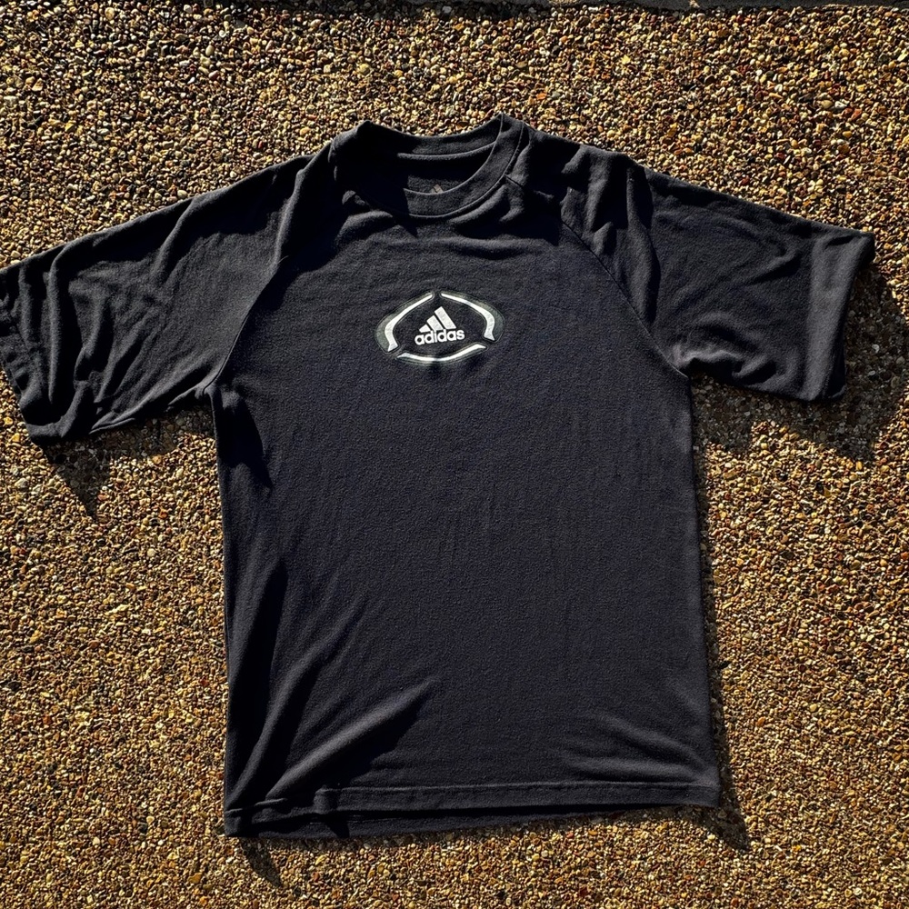Vintage Adidas’s sportswear shirt